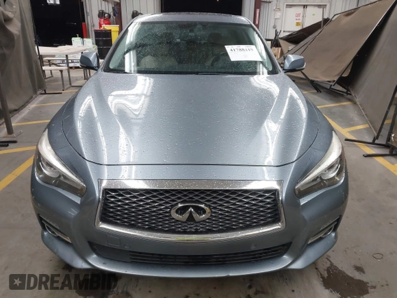 2015 Infiniti Q50 Premium z VIN JN1BV7AP6FM337369, wystawiony jako IAAI lot #41788419 z przebiegiem 106 977 mil mil oraz . Historia ofert i sprzedaży dostępna na DreamBid. Obrazek 12.