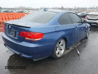 2007 BMW 3 Series 335i with VIN WBAWB73597P037969, listed as a IAAI auction lot 41602590 with 117,238 mi miles and . Bid and sale history available at DreamBid. Image 4.