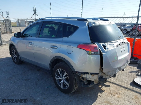 2016 Toyota RAV4 XLE with VIN 2T3WFREV1GW310309, listed as a IAAI auction lot 41993270 with 200,289 mi miles. Bid and sale history available at carsss.com. Image 3.