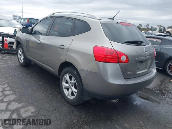 2009 Nissan Rogue SL with VIN JN8AS58T89W061346, listed as a IAAI auction lot 41772866 with 184,571 mi miles and . Bid and sale history available at DreamBid. Image 3.