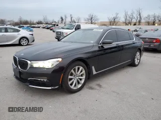 2018 BMW 7 Series 740i xDrive with VIN WBA7E4C50JGV23975, listed as a Copart auction lot 82354264 with 63,657 mi miles and Salvage Title. Bid and sale history available at carsss.com. Image 1.