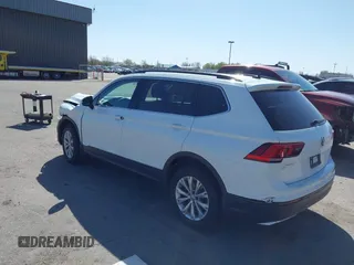 2019 Volkswagen Tiguan SE with VIN 3VV2B7AX8KM193166, listed as a IAAI auction lot 41957720 with 61,981 mi miles and . Bid and sale history available at DreamBid. Image 3.