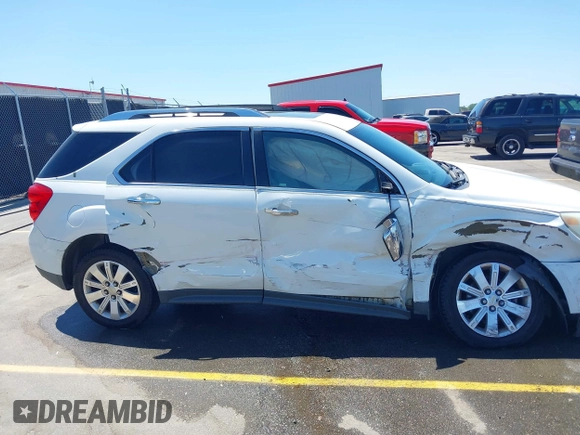 2011 Chevrolet Equinox 2LT z VIN 2CNFLPE50B6394569, wystawiony jako IAAI lot #42008653 z przebiegiem 238 617 mil mil oraz . Historia ofert i sprzedaży dostępna na DreamBid. Obrazek 13.