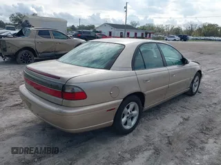 1998 Cadillac Catera z VIN W06VR52R3WR179841, wystawiony jako IAAI lot #41535621 z przebiegiem 103 204 mil mil oraz . Historia ofert i sprzedaży dostępna na DreamBid. Obrazek 4.