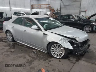 2012 Cadillac CTS with VIN 1G6DC5E59C0135916, listed as a IAAI auction lot 41504182 with 53,000 mi miles and . Bid and sale history available at DreamBid. Image 1.