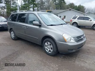 2010 Kia Sedona LX with VIN KNDMG4C30A6329449, listed as a IAAI auction lot 41946489 with 202,881 mi miles. Bid and sale history available at carsss.com. Image 1.