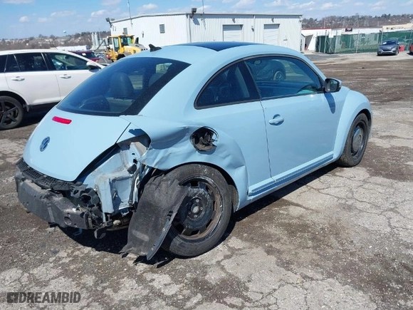 2013 Volkswagen Beetle Coupe 2.5L with VIN 3VWJP7AT5DM687994, listed as a IAAI auction lot 41878063 with 1 mi miles. Bid and sale history available at carsss.com. Image 4.