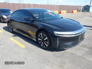 2023 Lucid Air Pure z VIN 50EA1PFA6PA009358, wystawiony jako IAAI lot #41950291 z przebiegiem 54 526 mil mil oraz . Historia ofert i sprzedaży dostępna na DreamBid. Obrazek 1.
