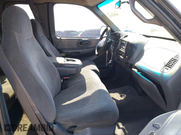 1999 Ford F-150 XL with VIN 1FTRX18L3XKA77743, listed as a IAAI auction lot 42512532 with Not provided miles and . Bid and sale history available at DreamBid. Image 5.