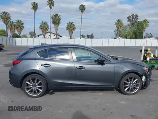 2018 Mazda 3 Touring with VIN 3MZBN1L32JM268582, listed as a IAAI auction lot 42072435 with 61,417 mi miles. Bid and sale history available at carsss.com. Image 13.