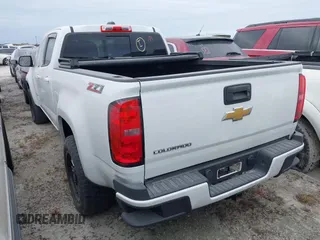 2017 Chevrolet Colorado 2WD Z71 z VIN 1GCGSDE18H1149666, wystawiony jako IAAI lot #40526720 z przebiegiem 142 451 mil mil oraz . Historia ofert i sprzedaży dostępna na DreamBid. Obrazek 3.