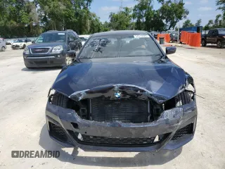 2023 BMW 5 Series 530i with VIN WBA53BH04PWY02486, listed as a Copart auction lot 54519385 with 26,979 mi miles and Salvage title. Bid and sale history available at DreamBid. Image 5.