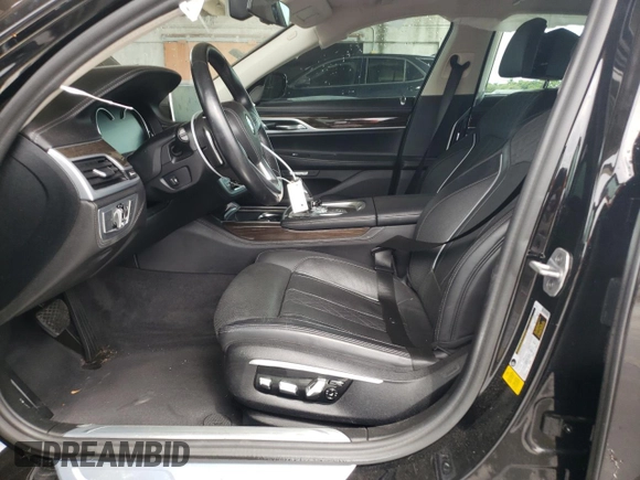 2017 BMW 7 Series 740i with VIN WBA7E2C31HG741176, listed as a Copart auction lot 65698233 with 27,332 mi miles. Bid and sale history available at carsss.com. Image 7.