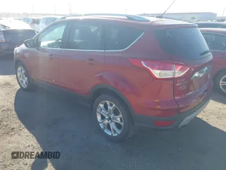 2014 Ford Escape Titanium with VIN 1FMCU9J98EUC24857, listed as a IAAI auction lot 41973037 with 160,634 mi miles. Bid and sale history available at carsss.com. Image 3.