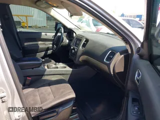 2015 Dodge Durango SXT with VIN 1C4RDJAG2FC114716, listed as a IAAI auction lot 41960920 with 227,497 mi miles and . Bid and sale history available at carsss.com. Image 5.