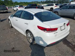 2016 Kia Optima LX with VIN 5XXGT4L32GG061779, listed as a IAAI auction lot 42746058 with 144,900 mi miles and . Bid and sale history available at DreamBid. Image 3.