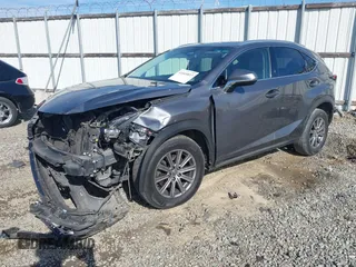 2016 Lexus NX 200t with VIN JTJYARBZ9G2036927, listed as a IAAI auction lot 41609837 with 215,448 mi miles. Bid and sale history available at carsss.com. Image 17.