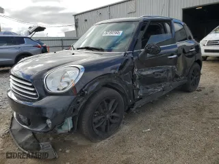 2013 MINI Cooper Countryman with VIN WMWZB3C58DWM07395, listed as a Copart auction lot 52193165 with 147,892 mi miles and Salvage Title. Bid and sale history available at carsss.com. Image 1.