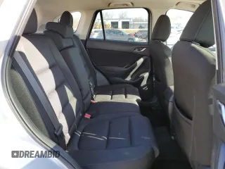 2016 Mazda CX-5 Touring with VIN JM3KE2CY8G0614335, listed as a Copart auction lot 52124465 with 218,320 mi miles and Salvage Title. Bid and sale history available at carsss.com. Image 11.