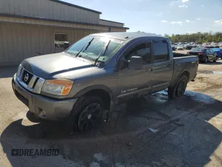 2015 Nissan Titan SL with VIN 1N6BA0EC5FN509230, listed as a Copart auction lot 73983574 with 144,288 mi miles and Salvage Title. Bid and sale history available at carsss.com. Image 1.