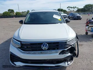 2023 Volkswagen Tiguan SE R-Line Black with VIN 3VVCB7AX0PM090710, listed as a IAAI auction lot 41256904 with 12,819 mi miles. Bid and sale history available at carsss.com. Image 12.