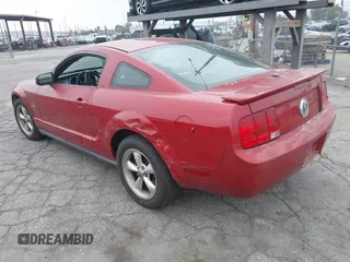 2008 Ford Mustang Deluxe with VIN 1ZVHT80N985100100, listed as a IAAI auction lot 42450593 with 164,853 mi miles and . Bid and sale history available at DreamBid. Image 3.