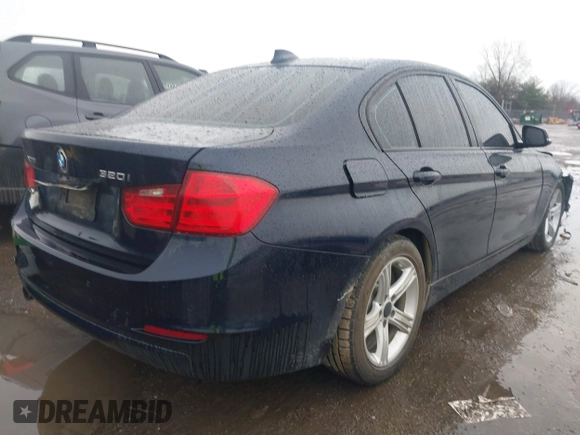 2015 BMW 3 Series 320i xDrive with VIN WBA3C3C57FP664631, listed as a IAAI auction lot 41117730 with 102,555 mi miles and . Bid and sale history available at DreamBid. Image 4.