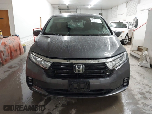 2021 Honda Odyssey Touring with VIN 5FNRL6H86MB026038, listed as a IAAI auction lot 41735249 with 68,480 mi miles. Bid and sale history available at carsss.com. Image 12.