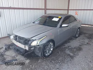 2017 Cadillac CTS Luxury RWD with VIN 1G6AR5SX8H0182157, listed as a IAAI auction lot 41884006 with 99,197 mi miles and . Bid and sale history available at DreamBid. Image 2.