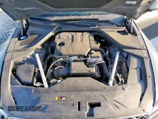 2023 Genesis G80 2.5T with VIN KMTGB4SC4PU185035, listed as a Copart auction lot 52082005 with 45,868 mi miles and Salvage title. Bid and sale history available at DreamBid. Image 13.