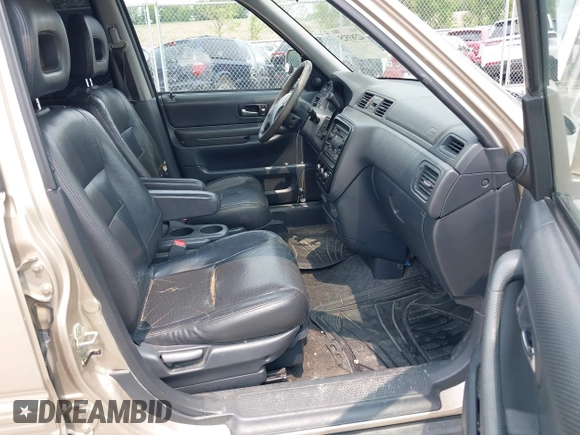 2001 Honda CR-V SE z VIN JHLRD187X1C052659, wystawiony jako IAAI lot #42383525 z przebiegiem 267 678 mil mil oraz . Historia ofert i sprzedaży dostępna na DreamBid. Obrazek 5.