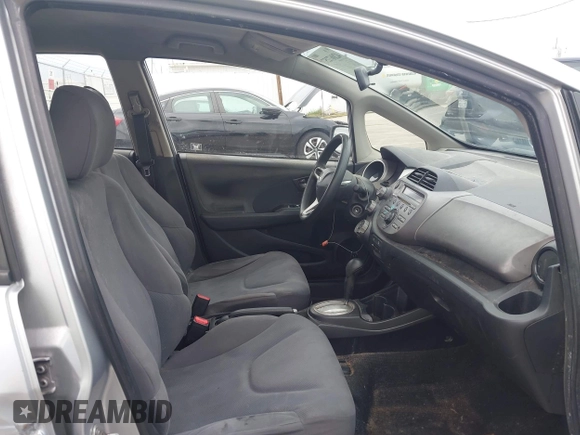 2013 Honda Fit with VIN JHMGE8H38DC002109, listed as a IAAI auction lot 42067257 with 305,739 mi miles. Bid and sale history available at carsss.com. Image 5.