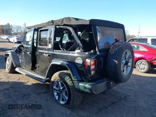 2021 Jeep Wrangler Unlimited Sahara with VIN 1C4HJXEN4MW714133, listed as a IAAI auction lot 41241040 with 82,247 mi miles and . Bid and sale history available at DreamBid. Image 3.
