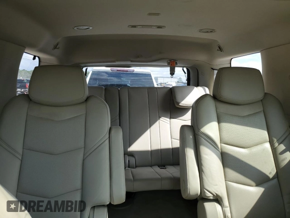 2020 Cadillac Escalade Luxury z VIN 1GYS3BKJ9LR217557, wystawiony jako Copart lot #80260884 z przebiegiem 63 461 mil mil oraz Szkoda całkowita • Salvage title. Historia ofert i sprzedaży dostępna na DreamBid. Obrazek 10.