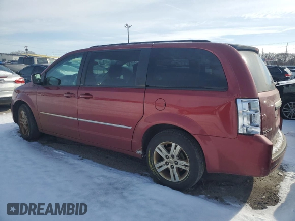 2010 Dodge Grand Caravan Crew with VIN 2D4RN6DX7AR446546, listed as a Copart auction lot 42484005 with 118,104 mi miles and Salvage Title. Bid and sale history available at DreamBid. Image 2.