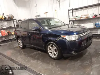 2014 Mitsubishi Outlander SE z VIN JA4AZ3A3XEZ002226, wystawiony jako IAAI lot #41701467 z przebiegiem 151 894 mil mil oraz . Historia ofert i sprzedaży dostępna na DreamBid. Obrazek 1.