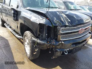 2013 Chevrolet Silverado 1500 LT with VIN 3GCPKSE71DG329253, listed as a IAAI auction lot 41723597 with 164,539 mi miles. Bid and sale history available at carsss.com. Image 6.