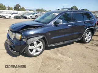 2011 Jeep Grand Cherokee Overland with VIN 1J4RR6GT9BC605307, listed as a Copart auction lot 58870425 with 139,088 mi miles and Salvage title. Bid and sale history available at DreamBid. Image 1.