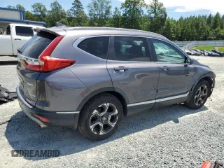 2018 Honda CR-V Touring with VIN 7FARW2H99JE013003, listed as a Copart auction lot 63364805 with 40,051 mi miles and Salvage title. Bid and sale history available at DreamBid. Image 3.