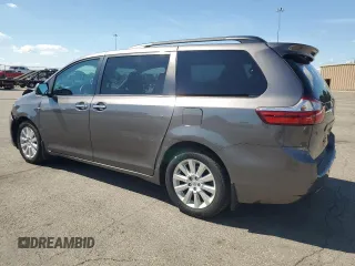 2016 Toyota Sienna Limited с VIN 5TDDK3DC0GS136248, выставлен на аукционе Copart как лот 63476815 с пробегом 131 970 миль миль и Списание • Salvage title. История ставок и продаж доступна на DreamBid. Изображение 2.