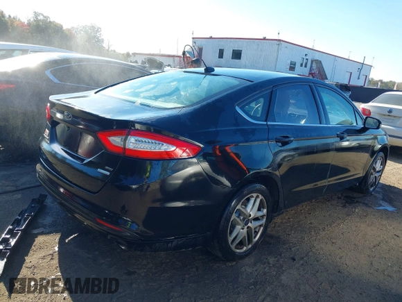 2016 Ford Fusion SE with VIN 1FA6P0HD0G5132790, listed as a IAAI auction lot 40604197 with 300,100 mi miles. Bid and sale history available at carsss.com. Image 4.