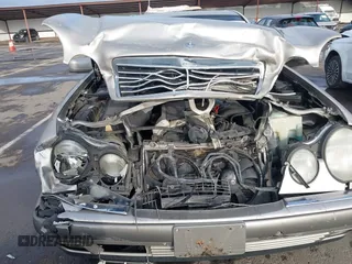 1997 Mercedes-Benz E-Class with VIN WDBJF55F3VA391335, listed as a IAAI auction lot 41606546 with 1 mi miles. Bid and sale history available at carsss.com. Image 6.