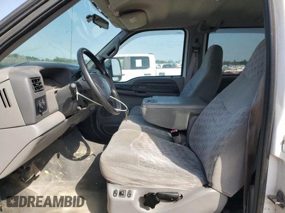 1999 Ford Super Duty F-250 XL with VIN 1FTNW21F9XED82013, listed as a Copart auction lot 44962945 with 394,926 mi miles and Clean Title. Bid and sale history available at carsss.com. Image 7.