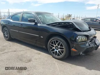 2010 Dodge Charger SXT with VIN 2B3CA3CV4AH153286, listed as a IAAI auction lot 42110970 with 162,424 mi miles and . Bid and sale history available at DreamBid. Image 1.