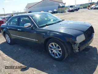 2006 Chrysler 300 C with VIN 2C3LA63H96H490736, listed as a IAAI auction lot 41998112 with 184,090 mi miles. Bid and sale history available at carsss.com. Image 1.