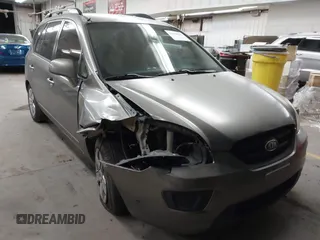 2009 Kia Rondo LX with VIN KNAFG528397223849, listed as a IAAI auction lot 41829039 with 239,467 mi miles. Bid and sale history available at carsss.com. Image 1.