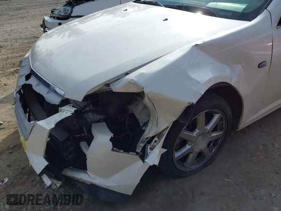2005 Cadillac STS z VIN 1G6DW677250198015, wystawiony jako IAAI lot #41543304 z przebiegiem 160 000 mil mil oraz . Historia ofert i sprzedaży dostępna na DreamBid. Obrazek 6.