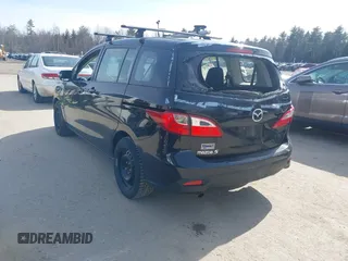 2014 Mazda 5 Sport with VIN JM1CW2BL5E0167153, listed as a IAAI auction lot 41790276 with 243,565 mi miles. Bid and sale history available at carsss.com. Image 3.