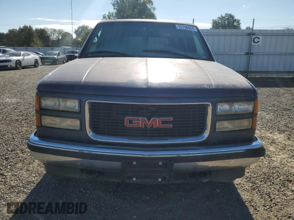 1999 GMC Yukon with VIN 1GKEK13R3XJ757466, listed as a Copart auction lot 75750884 with 270,768 mi miles and Salvage Title. Bid and sale history available at carsss.com. Image 5.
