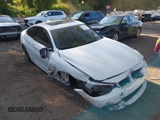 2018 BMW 4 Series 440i xDrive z VIN WBA4W9C55JAC09144, wystawiony jako IAAI lot #42390711 z przebiegiem 54 702 mil mil oraz . Historia ofert i sprzedaży dostępna na DreamBid. Obrazek 1.